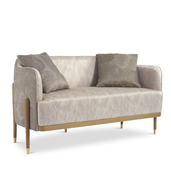 Elegant Italian luxury sofa with textured cushions and sleek design, perfect for sophisticated interiors.