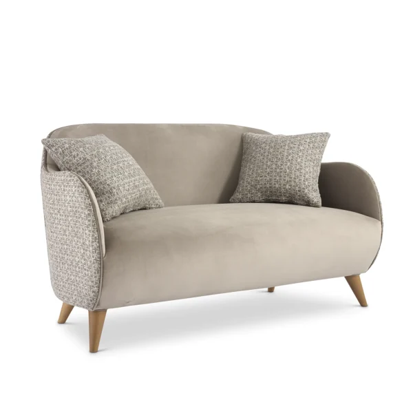 Italian luxury sofa with plush cushions, elegant design, gray upholstery, wooden legs by high-end furniture brand.