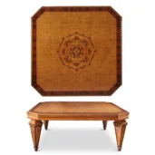 Italian luxury furniture: intricately designed wooden table with ornate patterns, showcasing craftsmanship and elegance.