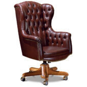 Poltrona in pelle bordeaux con schienale alto e dettagli in ottone
