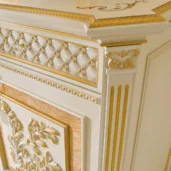 Elegant handmade wood furniture with intricate gold detailing from Italian villa and palace design.