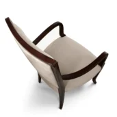 Luxury Italian design armchair with wooden frame and beige upholstery, crafted for high-end interiors.