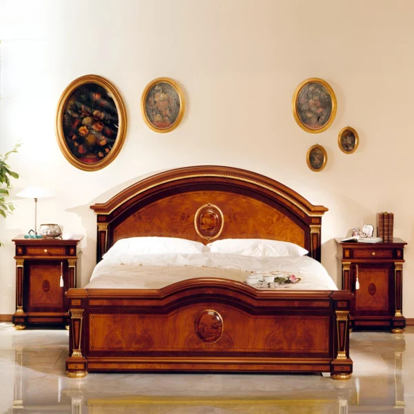 Classic wooden bedroom with elegant headboard and matching furniture. Custom and artisanal design.