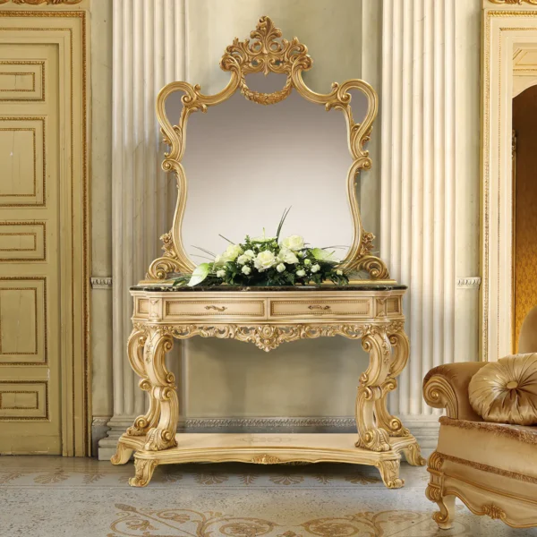 Luxury Italian gold console table with ornate mirror and floral arrangement, high-end design furniture in elegant setting.