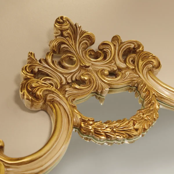 Luxurious Italian ornate mirror frame in gold, showcasing exquisite craftsmanship and elegant design details.