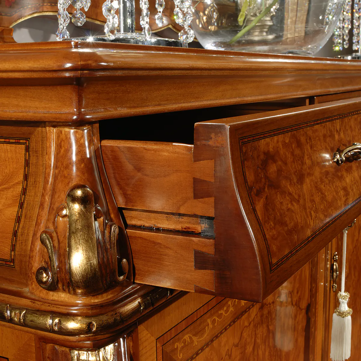 Elegant luxury Italian wooden furniture with intricate design and craftsmanship. High-end drawer detail in close-up.