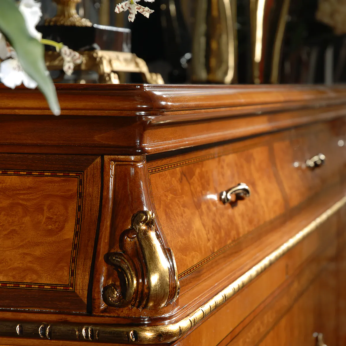 High-end luxury Italian wooden cabinet with gold accents and intricate detailing, handcrafted by artisans.