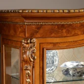 Elegant display cabinet showcasing fine custom furniture, made in Italy