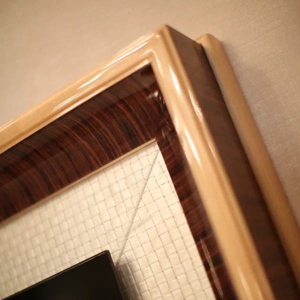 Close-up of handcrafted wooden furniture detail, showcasing elegant design and craftsmanship for luxury interiors.
