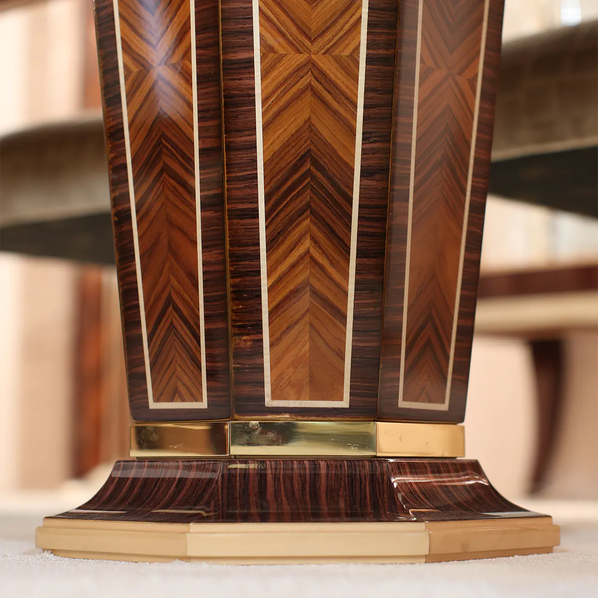 Luxurious wooden furniture with intricate inlay design, crafted for elegant villas by Italian artisans.