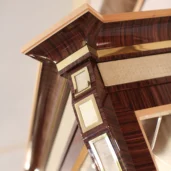 Handcrafted luxury furniture detail in polished wood and gold accents, ideal for villas and palaces interior design.
