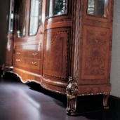 Luxurious handcrafted wooden cabinet with intricate detailing for villas and palaces. Italian craftsmanship at its finest.