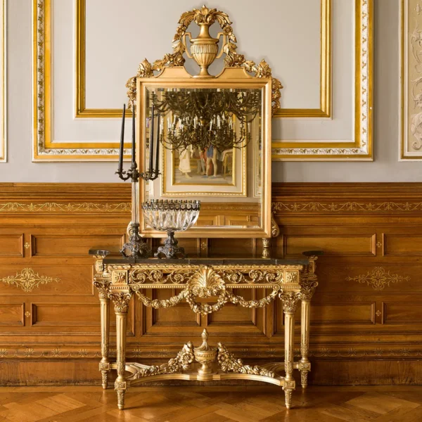 Elegant handcrafted Italian console table in opulent villa interior with gold accents and intricate wood detailing.