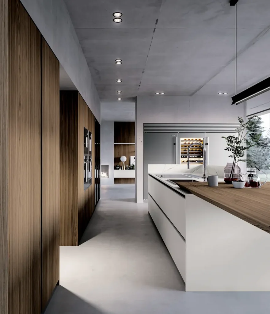 Cucina moderna di lusso con isola centrale e finiture in legno. Design elegante per ambienti esclusivi.