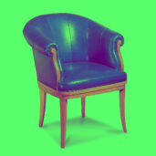Blue leather chair with curved backrest, padded seat, and polished wooden legs and armrests