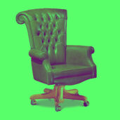 Green leather office chair with tufted backrest and wooden base