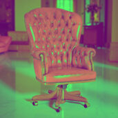 Red leather office armchair with tufted backrest and wooden base