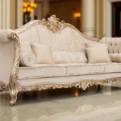Wagner classic three-seater Baroque sofa with hand-carved gilded wood frame and light damask fabric upholstery.