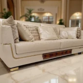 Luxurious handcrafted Italian sofa in elegant wood and leather, designed for exclusive villa interiors.
