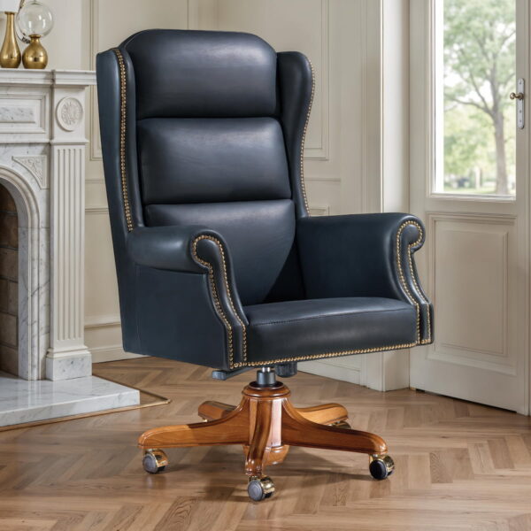 Black leather wingback executive office chair with rolled arms, brass nailhead trim and wood swivel base on casters – Marzorati