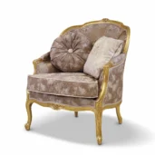 Louis XV style classic armchair featuring a carved wood and gold leaf finish frame, upholstered in beige damask fabric with decorative cushions, on a white background.