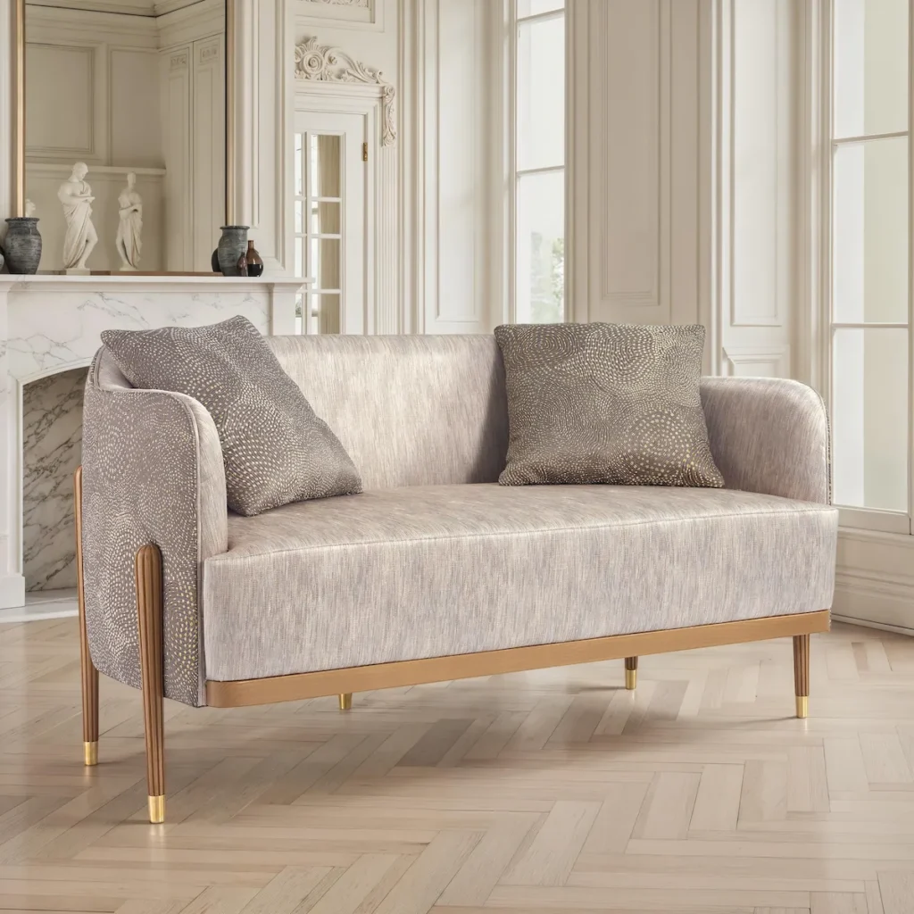 Luxury modern light fabric sofa with brass legs and tips, ideal for elegant living rooms
