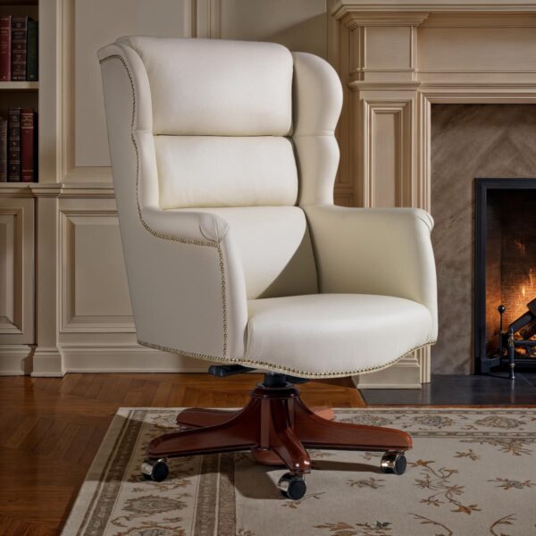 Marzorati executive chair in ivory leather with segmented padded high back, nailhead trim, solid wood five-star swivel base with casters.