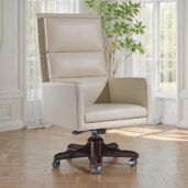 Marzorati executive chair in ivory leather with high triple‑cushion back, straight arms, solid wood five‑star swivel base with casters, height adjustable.