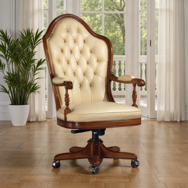 Marzorati executive office chair in ivory leather with high button‑tufted back, turned arm supports, nailhead trim and a five‑star wooden base on casters.