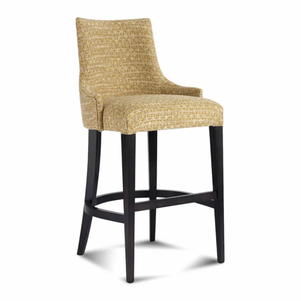 Counter‑height upholstered barstool with wraparound back, mustard textured fabric, dark wood legs and curved footrest stretcher – Marzorati.