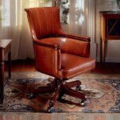Handcrafted brown leather executive chair, perfect for luxury offices and professional studies