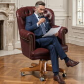 Bordeaux leather executive chair with tufted design, perfect for luxury offices and classic professional interiors