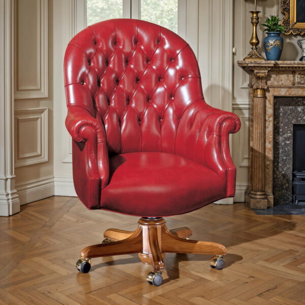 Marzorati red leather executive armchair with capitonné backrest and solid wood base, luxury Italian office furniture
