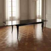 Extendable dining table handcrafted in burl veneer with glossy finish and elegant sculpted legs, ideal for luxury interiors.