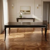 Extendable dining table handcrafted in burl veneer with glossy finish and elegant sculpted legs, ideal for luxury interiors.