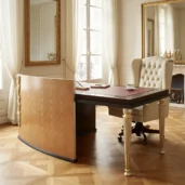 Luxury neoclassical solid wood desk with red leather top and gold-finished fluted legs, handcrafted by Marzorati.