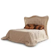 Luxury double bed isolated on white featuring a tall beige tufted headboard with ornate gold leaf wood carvings and textured bedding