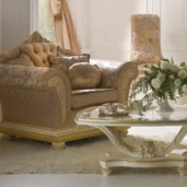 Edo armchair in carved wood, luxury living room setting