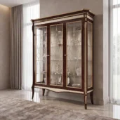 Luxury ebony wood display cabinet with gold finishes, glass doors and ivory woven inserts, high-end classic furniture