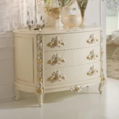 Eleonor dresser in ivory lacquered wood with hand-carved gold floral details.