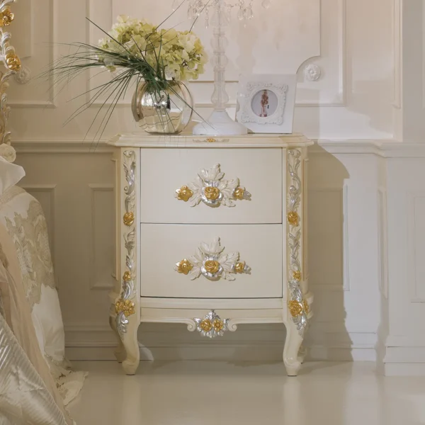 Eleonor nightstand in hand-carved wood with floral details and gold accents.