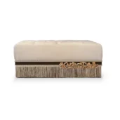 Flora bed-end bench upholstered with fringe and carved wood details, luxury Italian craftsmanship.