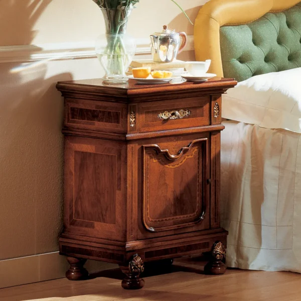 Granducato nightstand hand-carved, beside a luxury bed, Italian craftsmanship.
