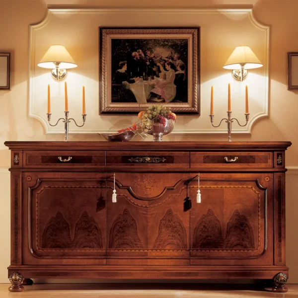 Granducato sideboard in hand-carved wood with silver details, styled in an Italian villa.