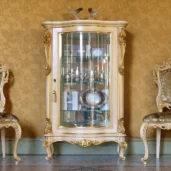 Louvre 1-door curio cabinet in carved wood with gold details, luxury Italian craftsmanship.