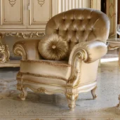Louvre gold armchair in carved wood, luxury Italian craftsmanship.