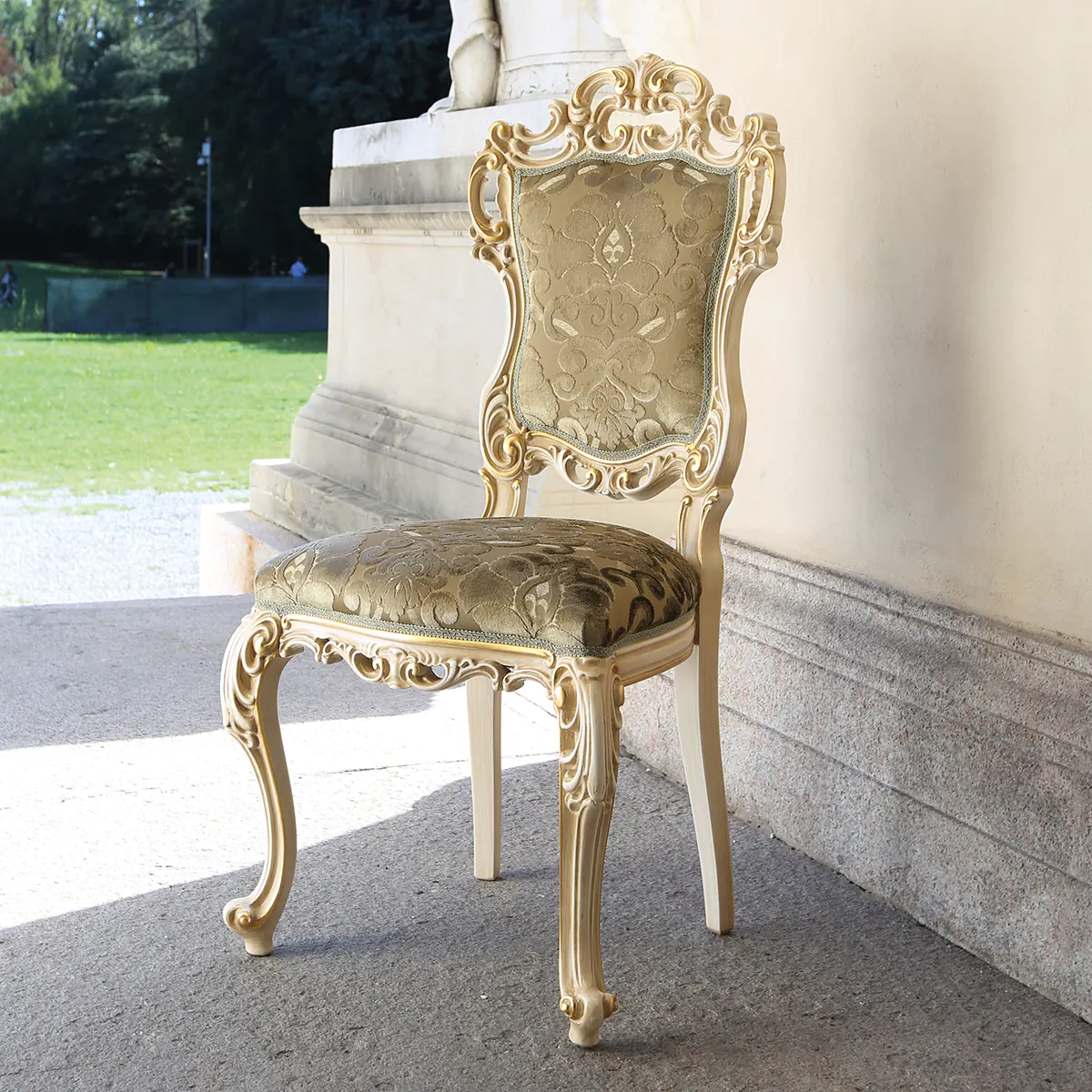 LOUVRE chair thumbnail EN Louvre chair in carved wood with elegant upholstery, luxury Italian craftsmanship.