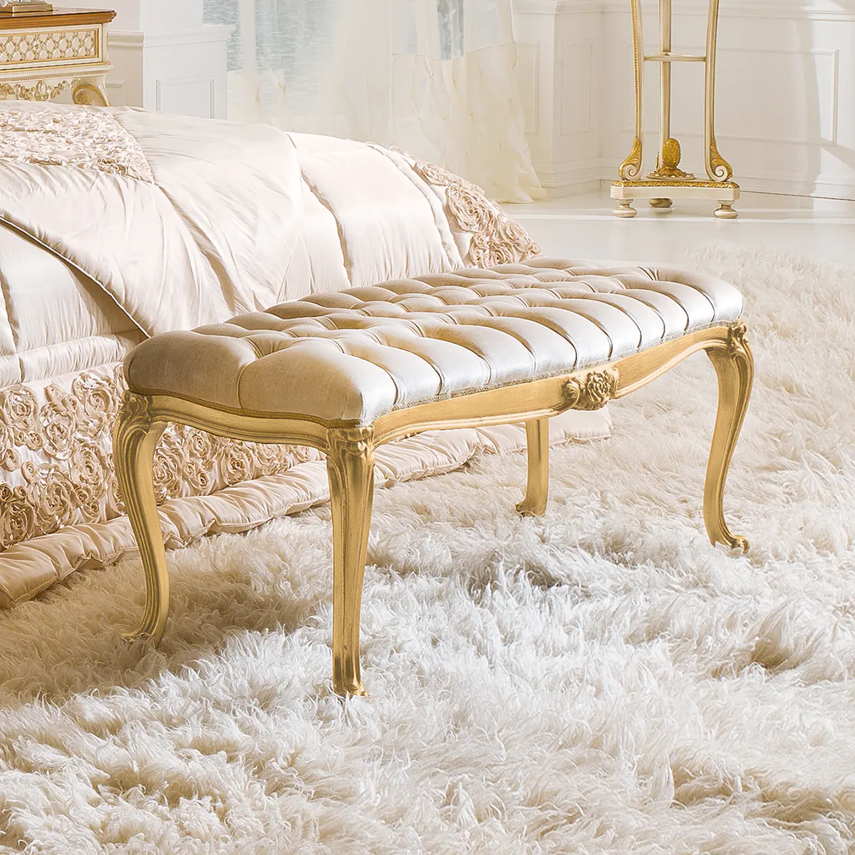MAGNUM bench thumbnail EN Magnum upholstered bench with tufted finish and gold details, luxury Italian craftsmanship.