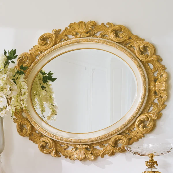 Magnum oval mirror with carved gold frame, luxury Italian craftsmanship.