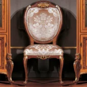 Mondial chair in carved wood with velvet upholstery, luxury Italian craftsmanship.
